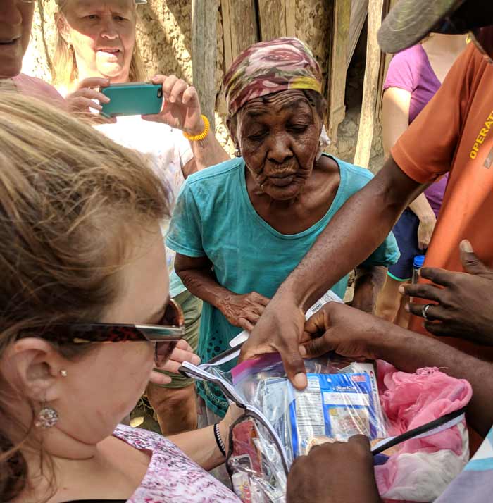 a widow receiving donated food